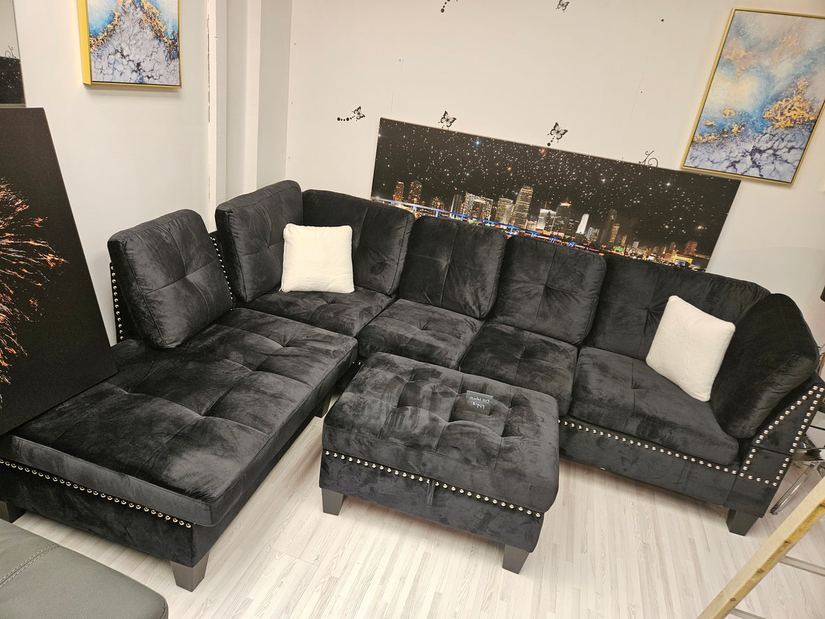 Black Velvet Sectional With Storage Ottoman & White Throw Pillows Mod